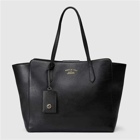 gucci swing leather black tote wearing model|genuine Gucci tote bags.